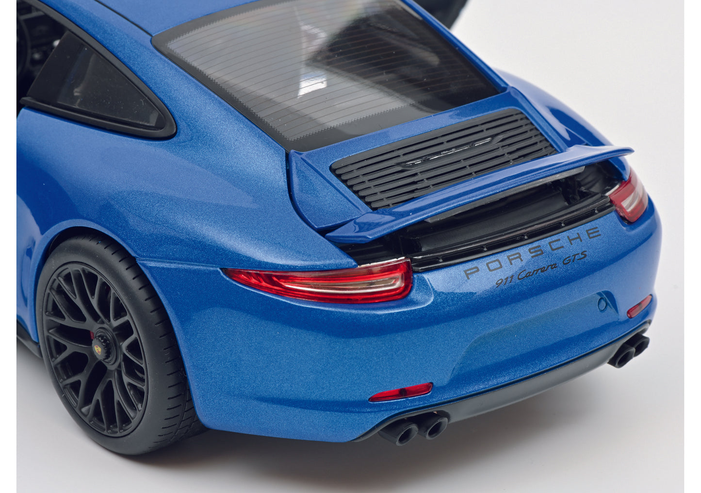 Schuco 450039700 - Porsche GTS Coupé blue 1:18 EAN: 4007864057894, at Ajckids.com, authorized Schuco dealer for the USA.