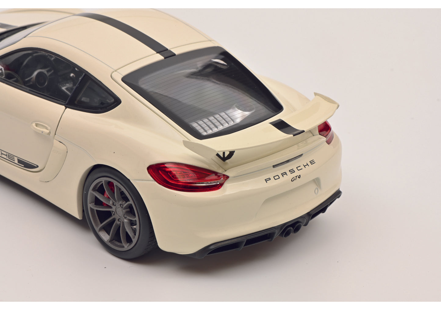 Schuco 450040500 - Porsche Cayman GT4 white 1:18 EAN: 4007864057566, at Ajckids.com, authorized Schuco dealer for the USA.