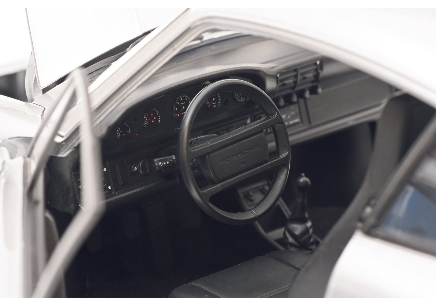 Schuco 450669900 - Porsche 911 Coupé silver 1:12 EAN: 4007864062942, at Ajckids.com, authorized Schuco dealer for the USA.